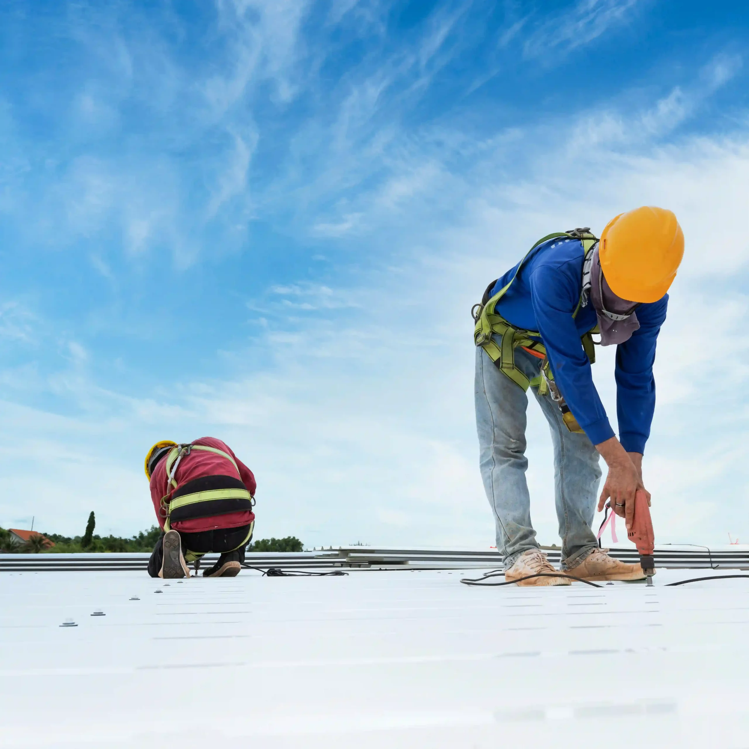 Workers on commercial roof
